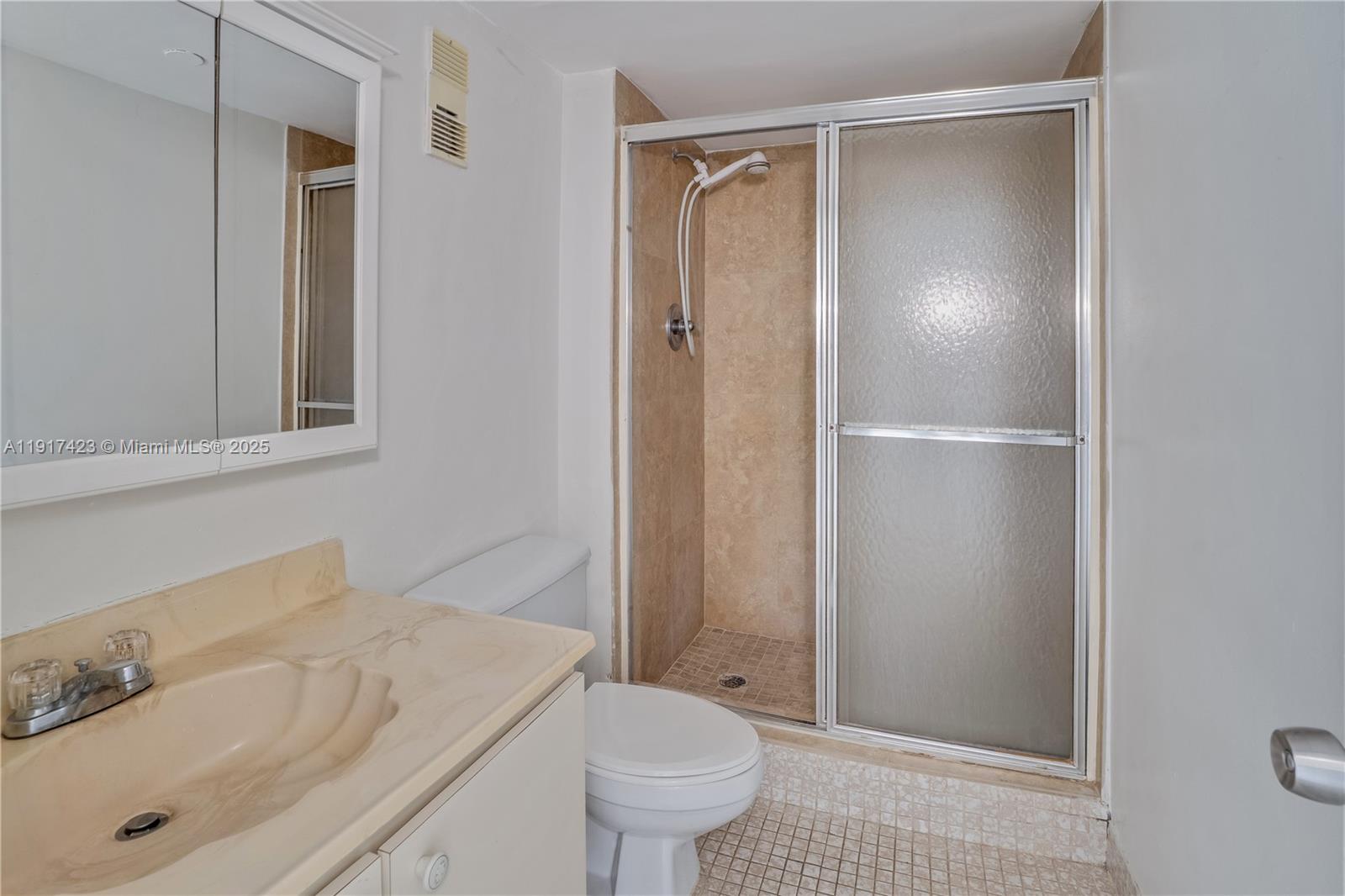 1200 St Charles Place, Unit 716 Pembroke Pines, FL 33026 - Photo 17 of 29 a bathroom with a sink toilet and shower