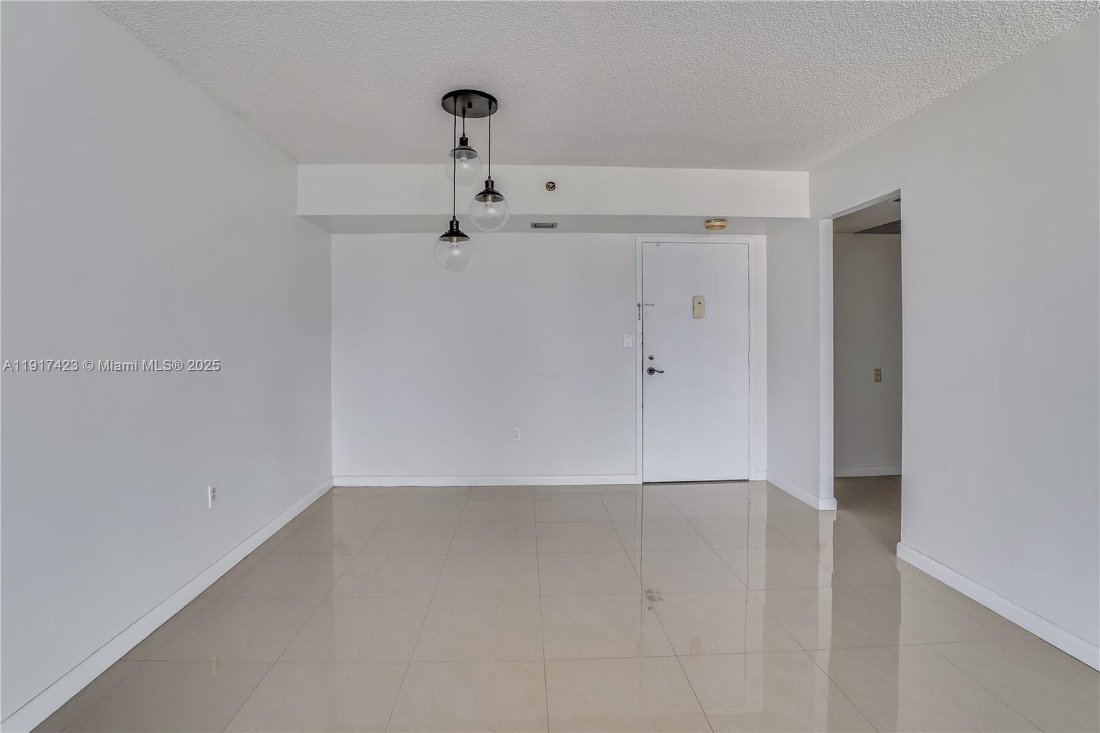 1200 St Charles Place, Unit 716 Pembroke Pines, FL 33026 - Photo 8 of 29 a view of an empty room
