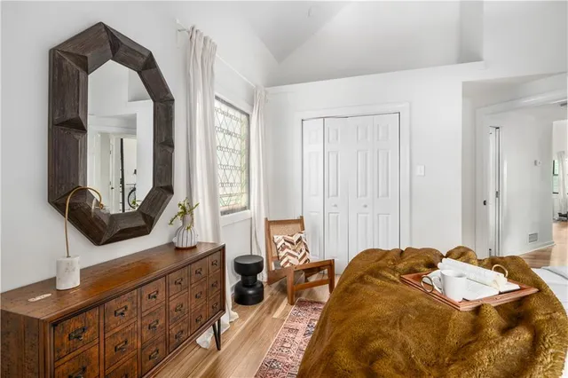 a blue white and black and white photo of a living room