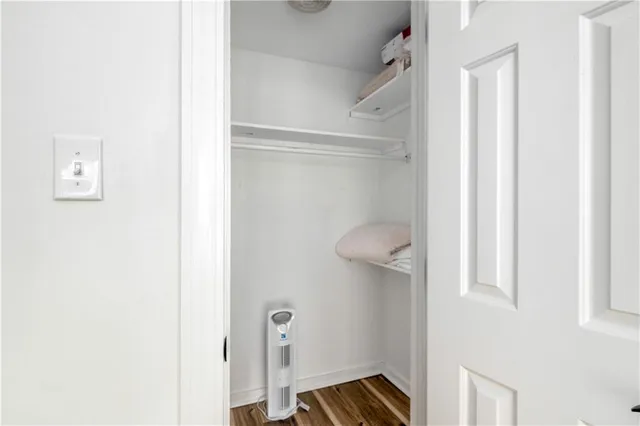 a room with furniture and flowerpot