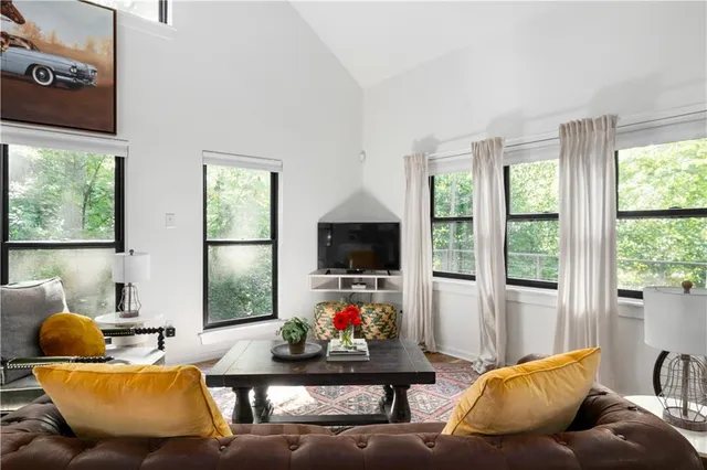 a view of house that has a car park