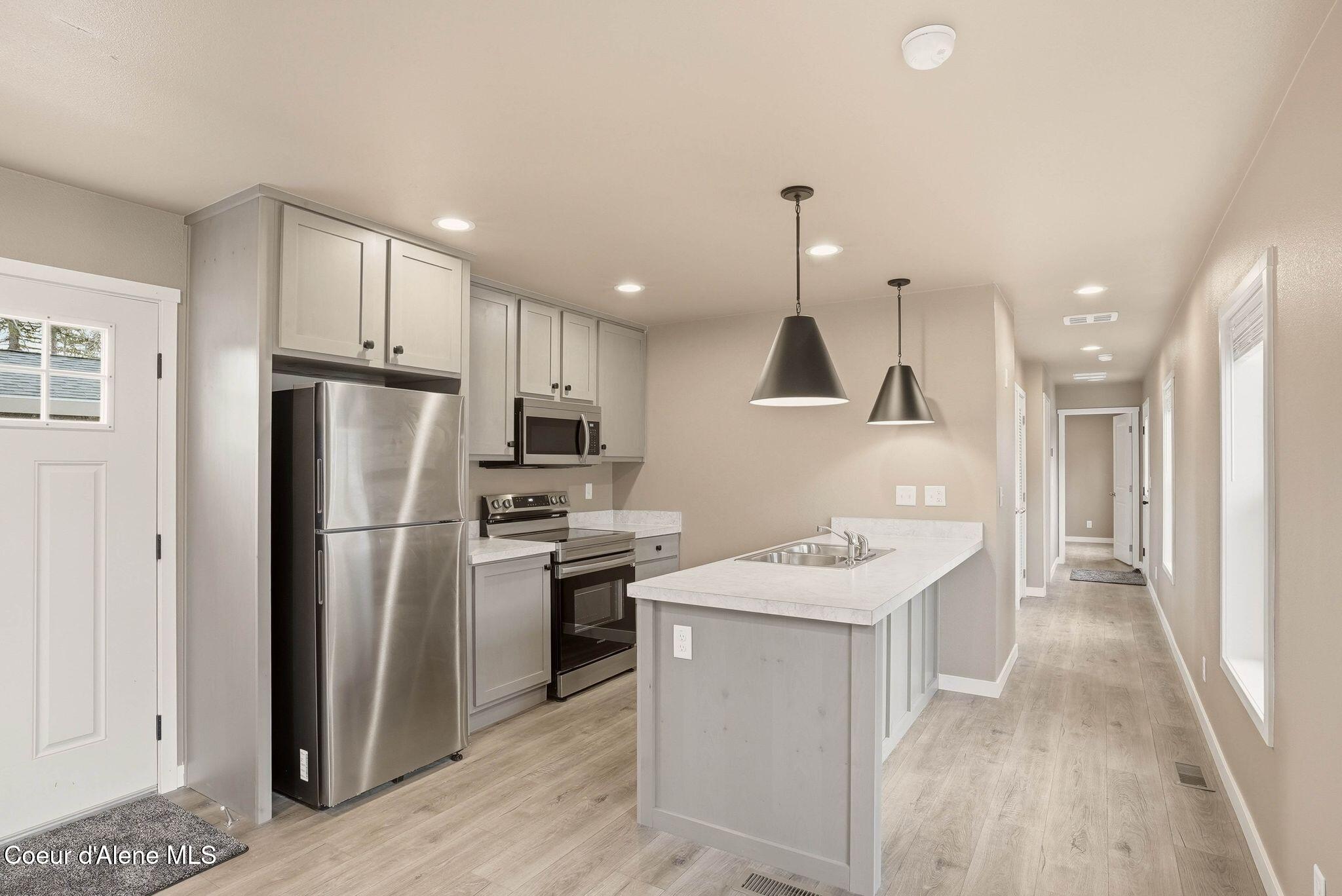 11776 Hauser Lake Road, Unit SPC 15 Hauser, ID 83854 - Photo 2 of 20 Inside-Media- N Hauser-11