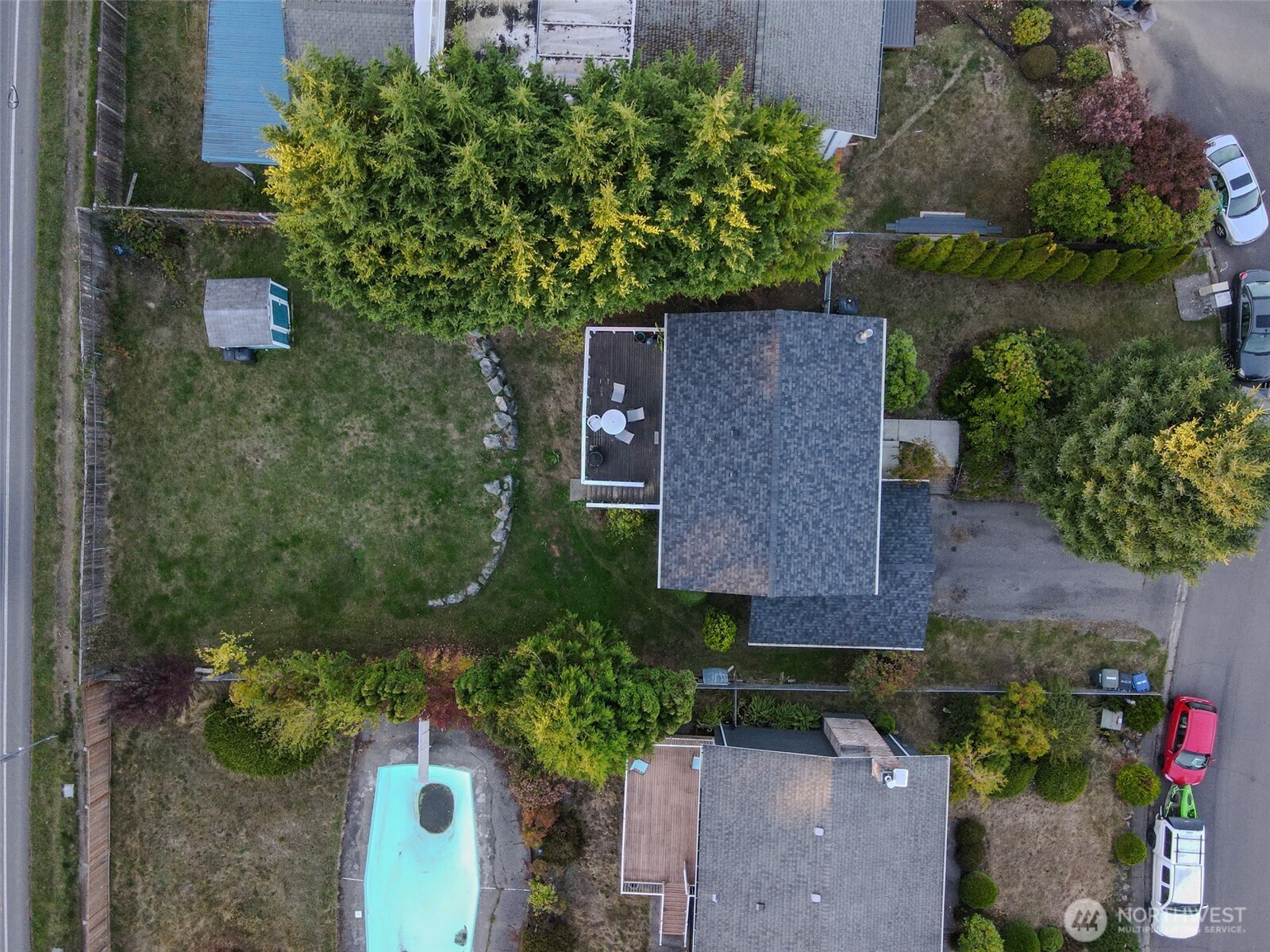 22502 3rd Place West Bothell, WA 98021 - Photo 3 of 10 an aerial view of a house with a yard basket ball court and outdoor seating