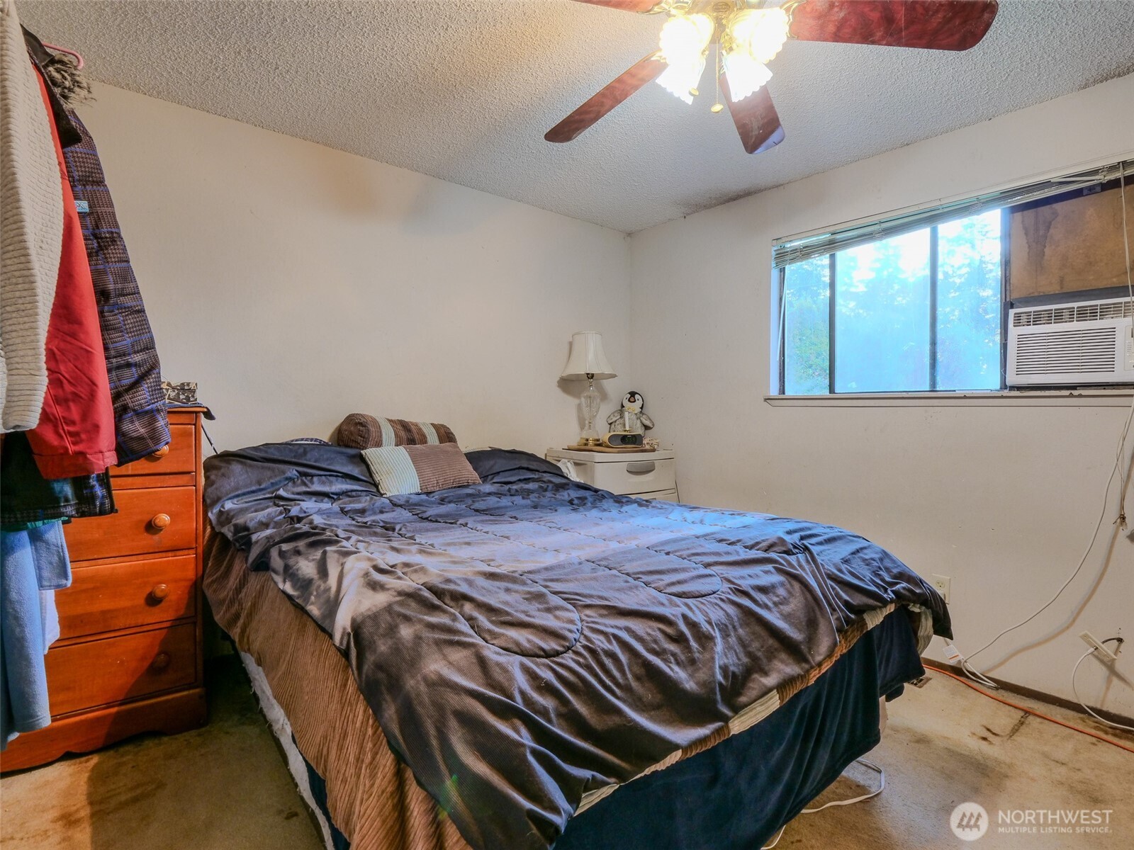 22502 3rd Place West Bothell, WA 98021 - Photo 9 of 10 a bedroom with a bed and a window