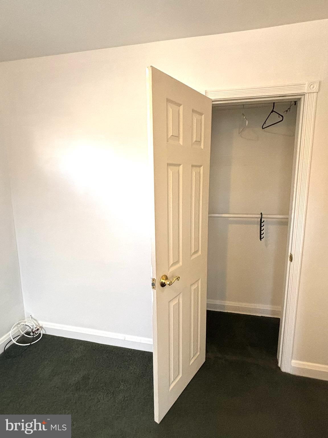6527 Hilltop Avenue Baltimore, MD 21206 - Photo 16 of 32 a view of a small space with wooden floor and closet