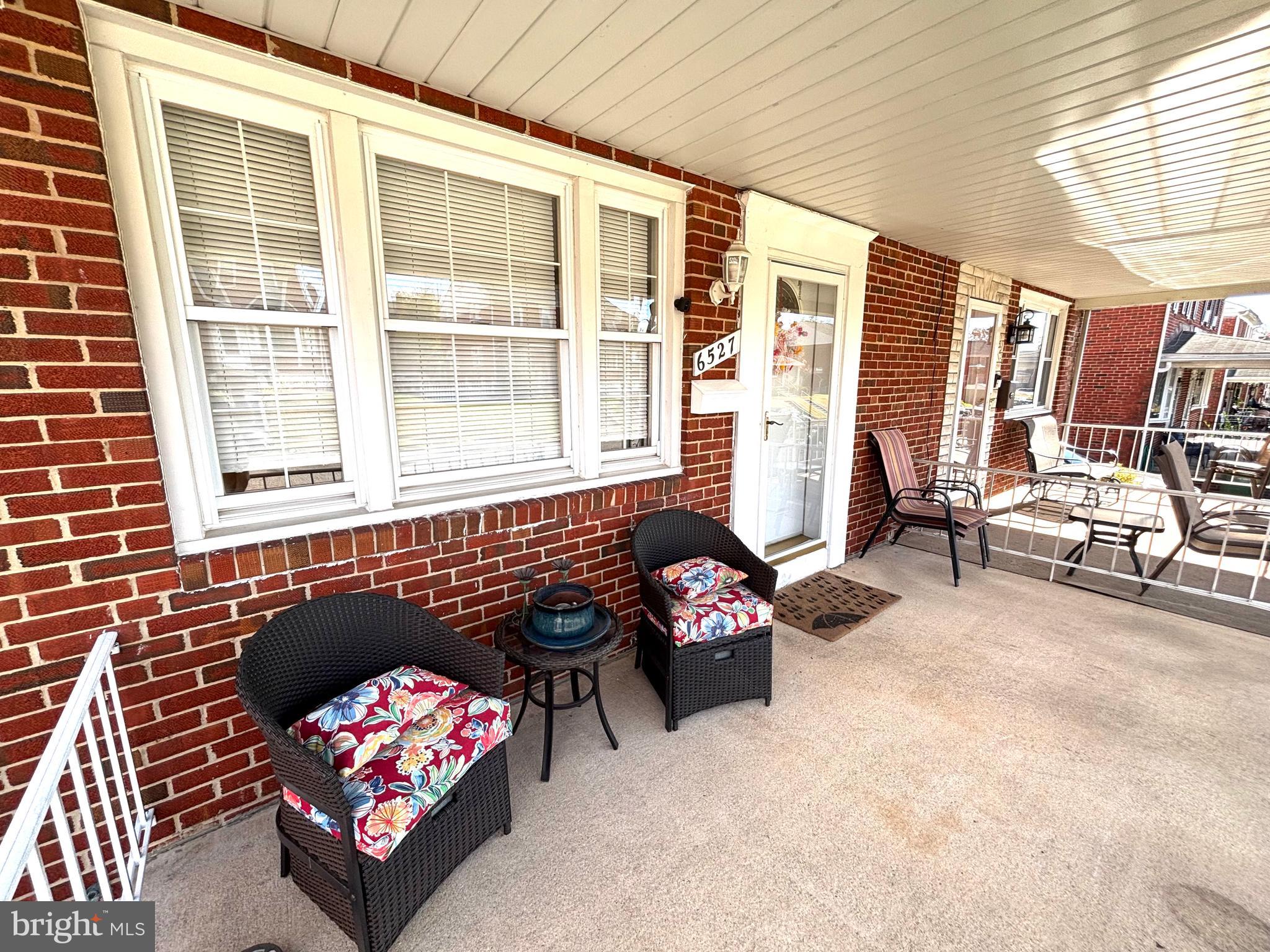 6527 Hilltop Avenue Baltimore, MD 21206 - Photo 3 of 32 a living room filled with furniture and a couch
