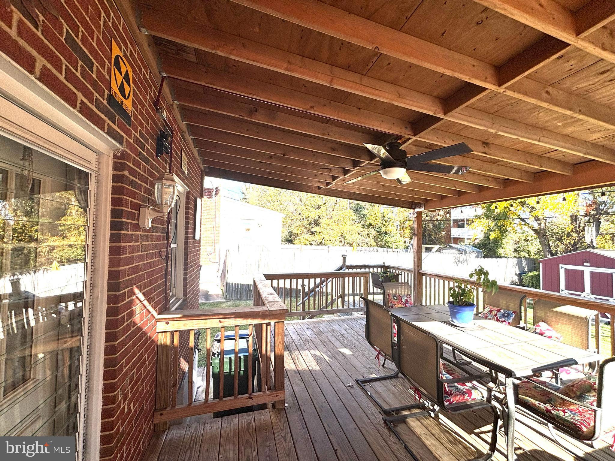 6527 Hilltop Avenue Baltimore, MD 21206 - Photo 31 of 32 a view of a patio with wooden floor