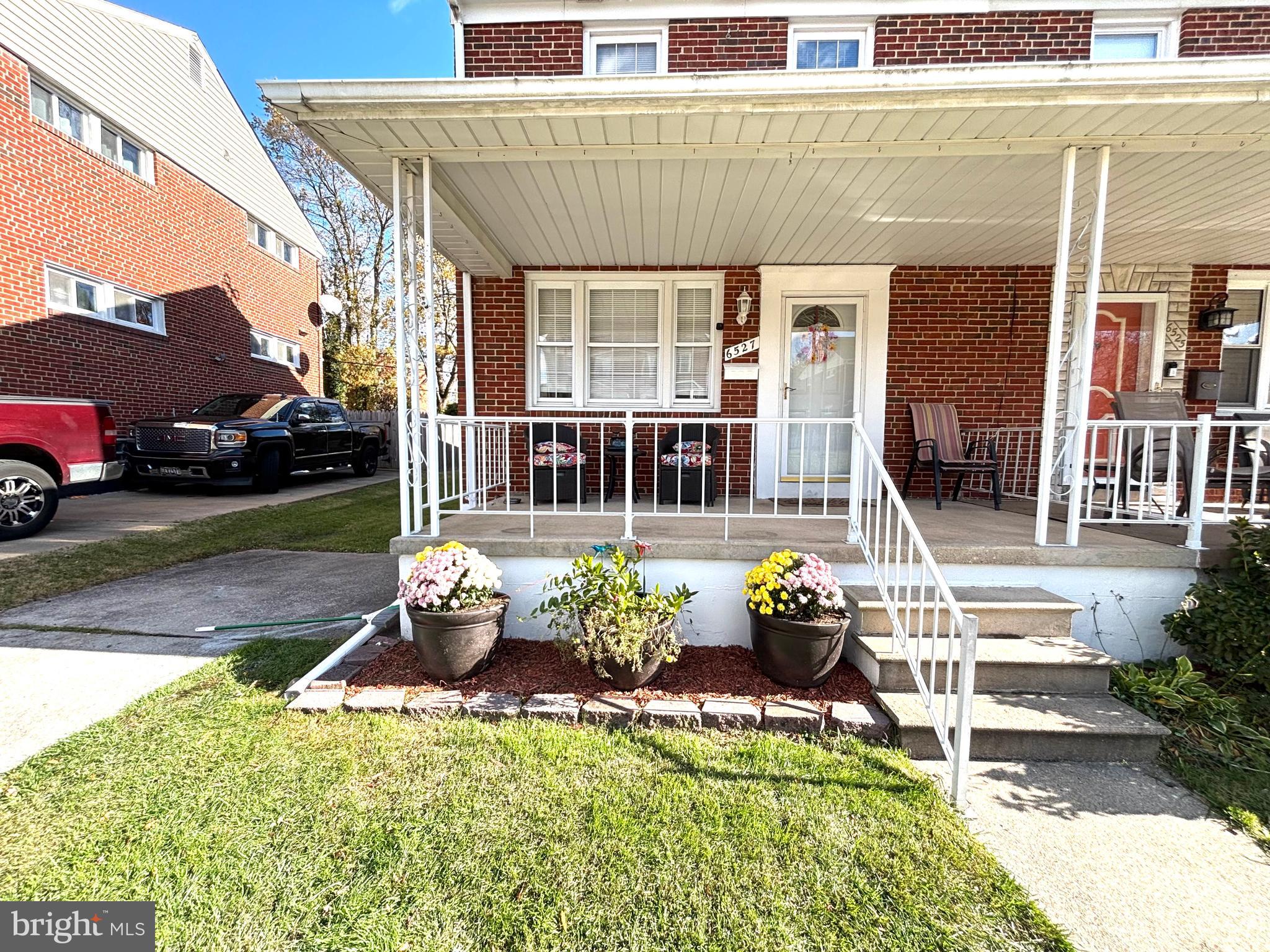 6527 Hilltop Avenue Baltimore, MD 21206 - Photo 4 of 32 a garden view with a seating space