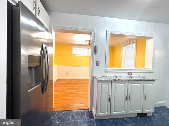 a view of walk in closet with window