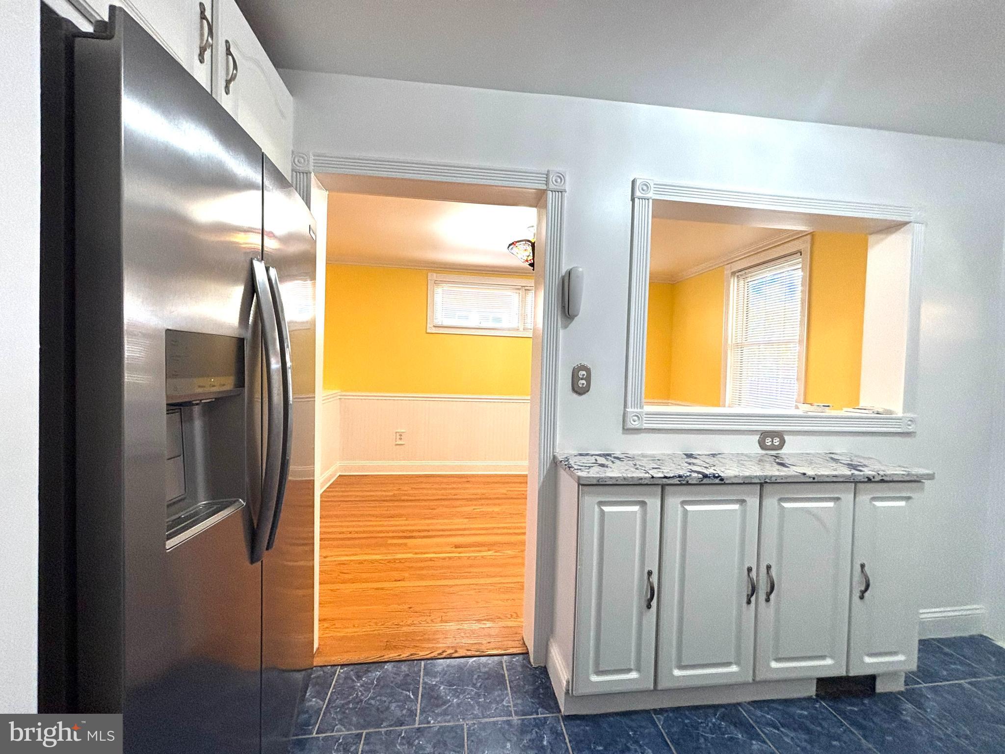 6527 Hilltop Avenue Baltimore, MD 21206 - Photo 10 of 32 a view of walk in closet with window