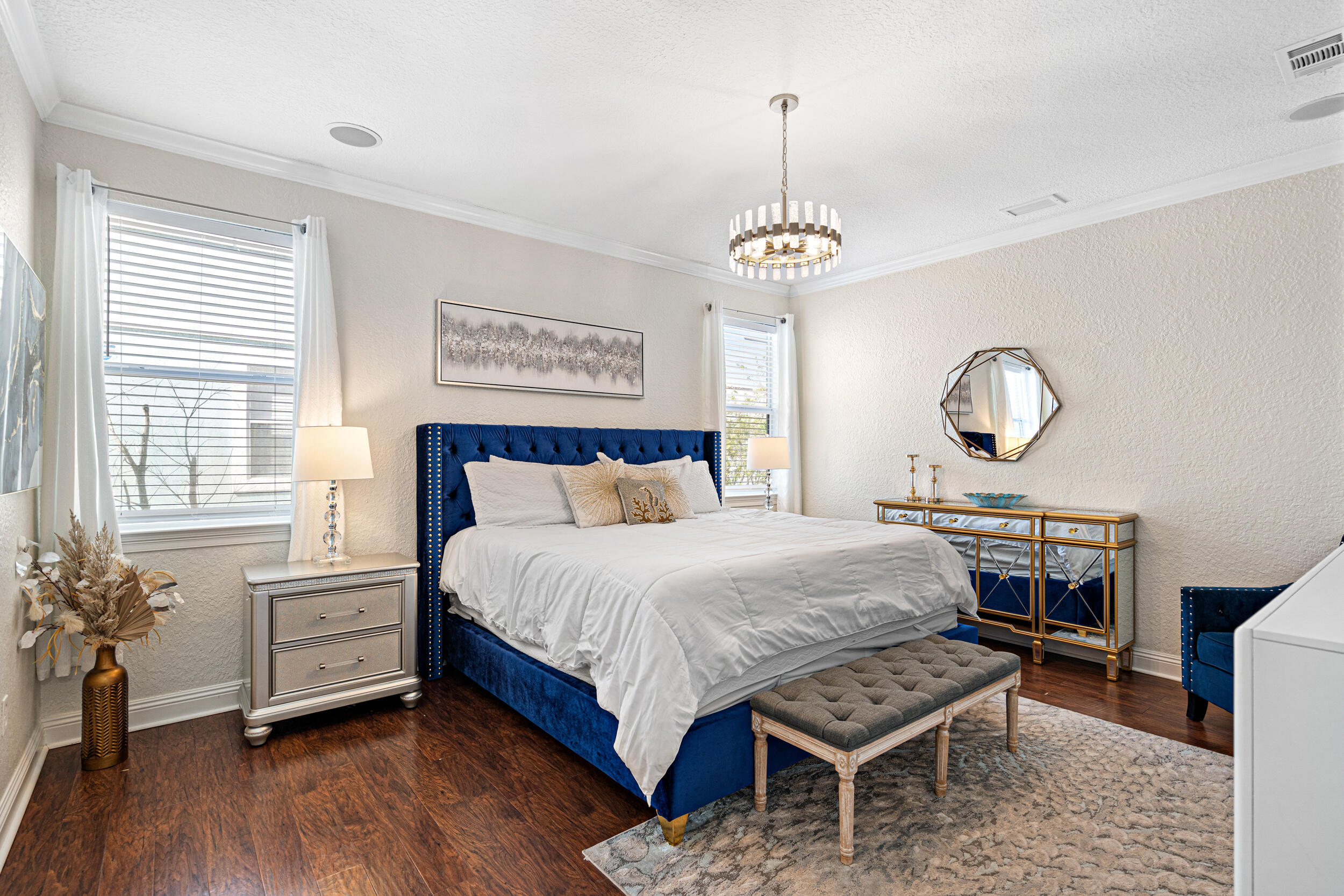 230 Kono Way Destin, FL 32541 - Photo 12 of 41 a bedroom with a bed chandelier and a window