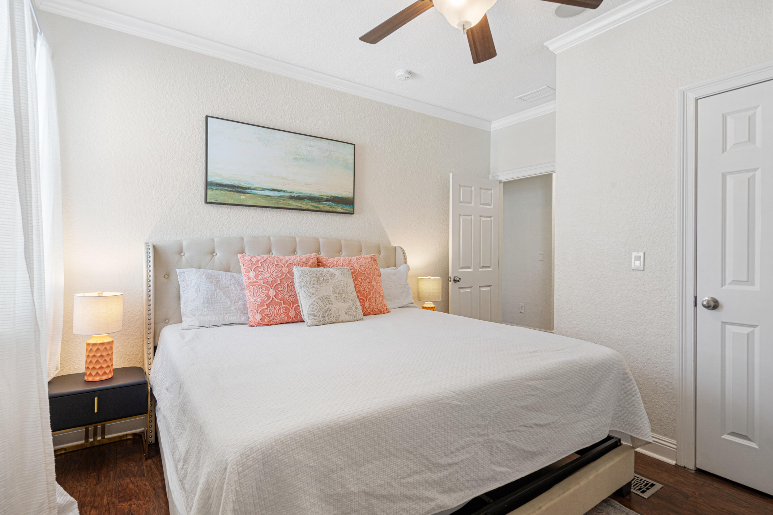 230 Kono Way Destin, FL 32541 - Photo 22 of 41 a bedroom with a bed and a painting on the wall