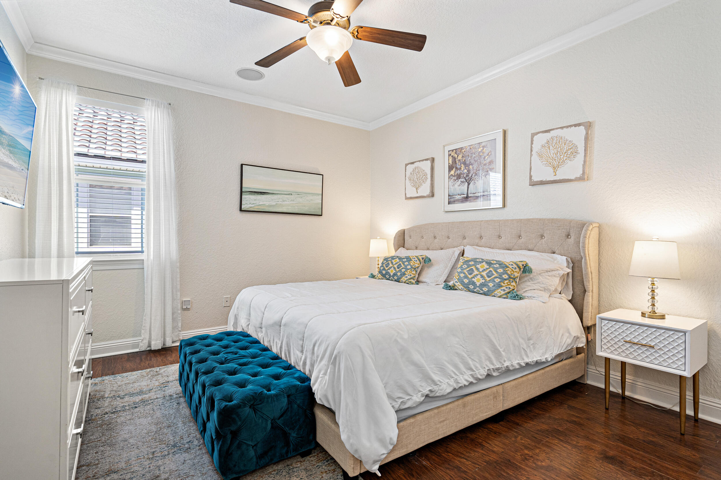 230 Kono Way Destin, FL 32541 - Photo 24 of 41 a bedroom with a bed and wooden floor