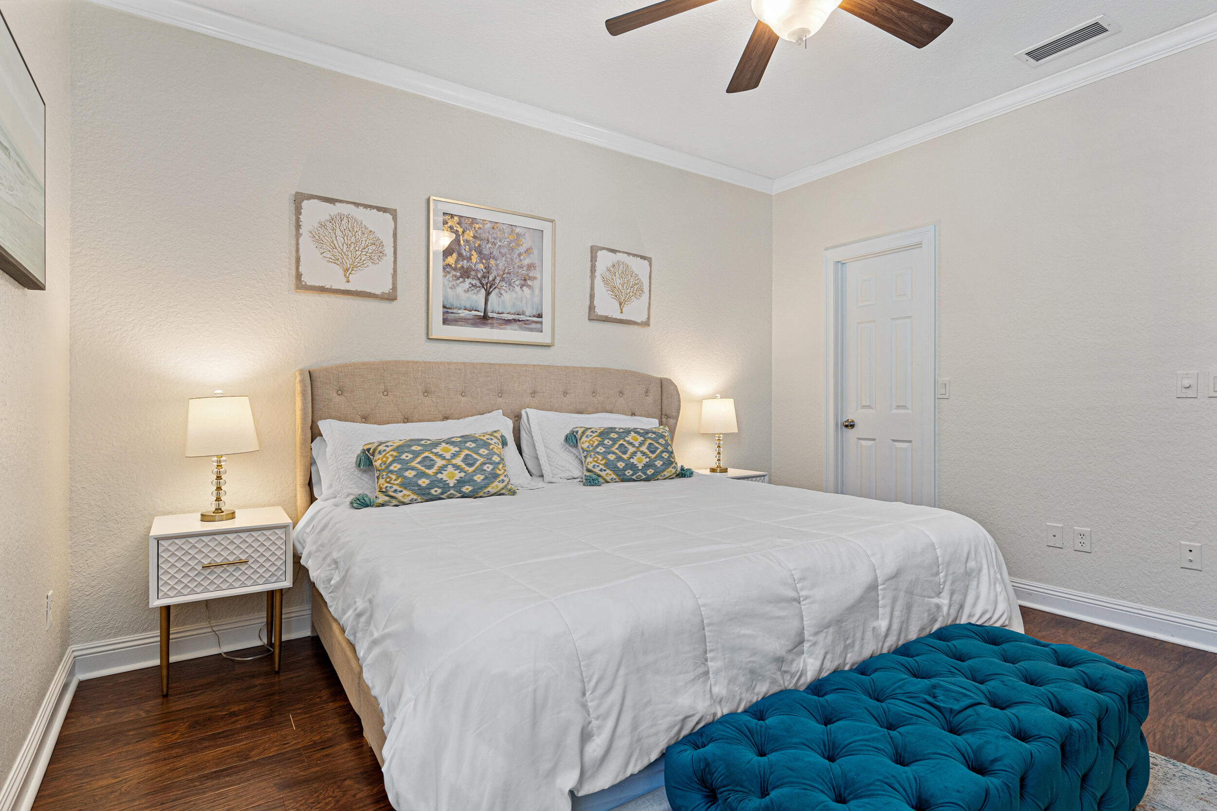 230 Kono Way Destin, FL 32541 - Photo 25 of 41 a bedroom with a bed and a chandelier