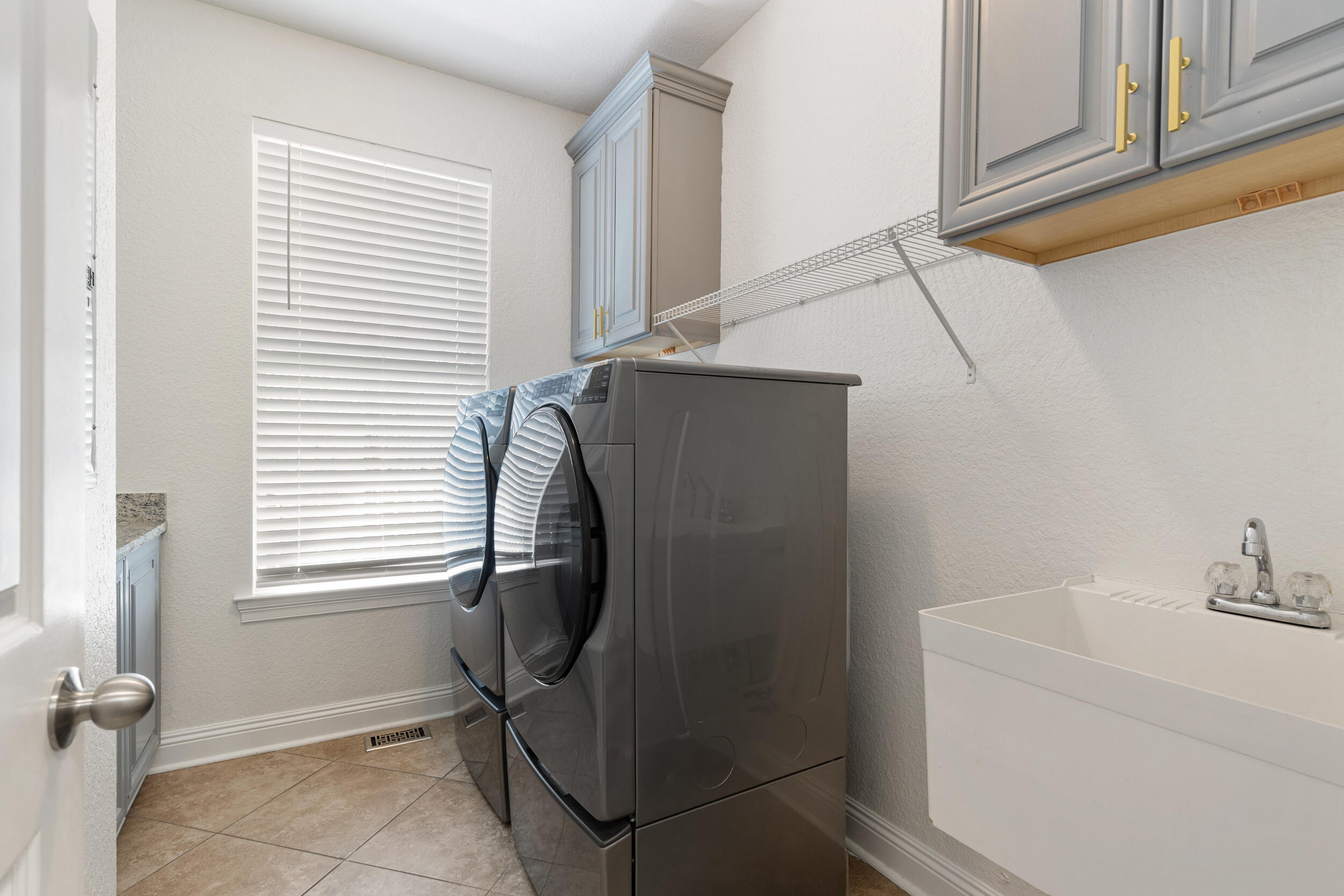 230 Kono Way Destin, FL 32541 - Photo 26 of 41 a bathroom with a sink and a mirror