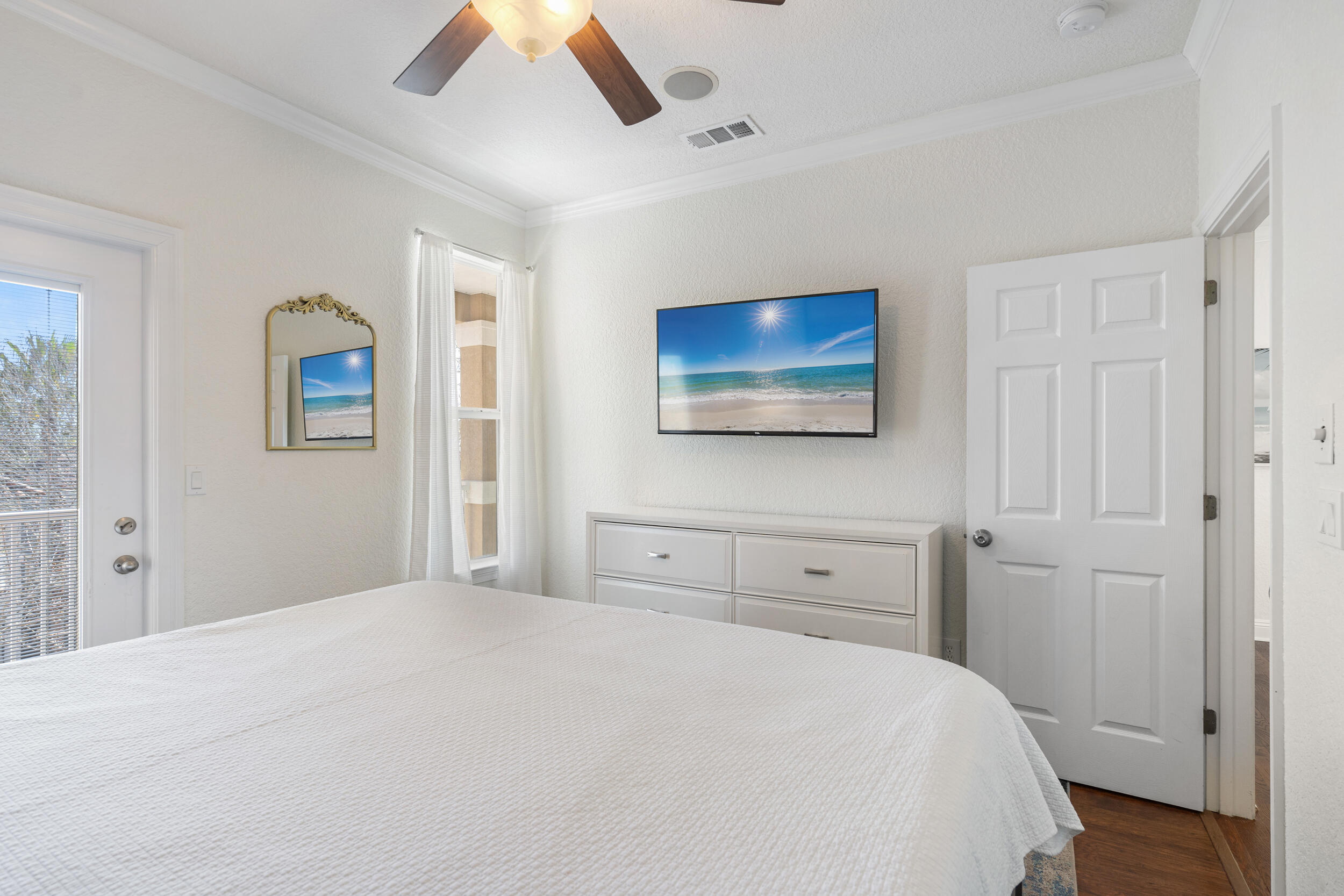 230 Kono Way Destin, FL 32541 - Photo 29 of 41 a bedroom with a bed and a tv