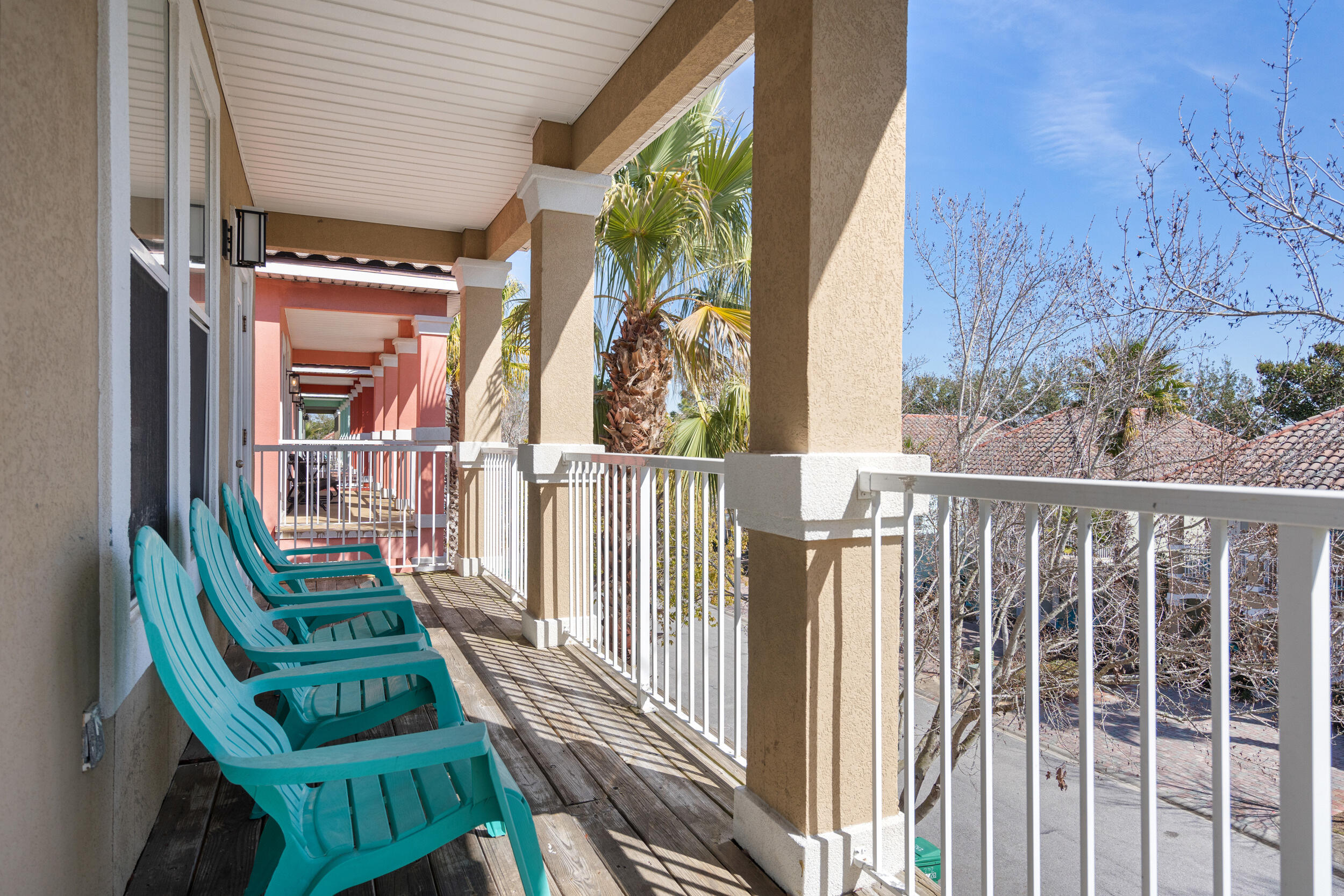 230 Kono Way Destin, FL 32541 - Photo 34 of 41 a view of a balcony with wooden floor and fence