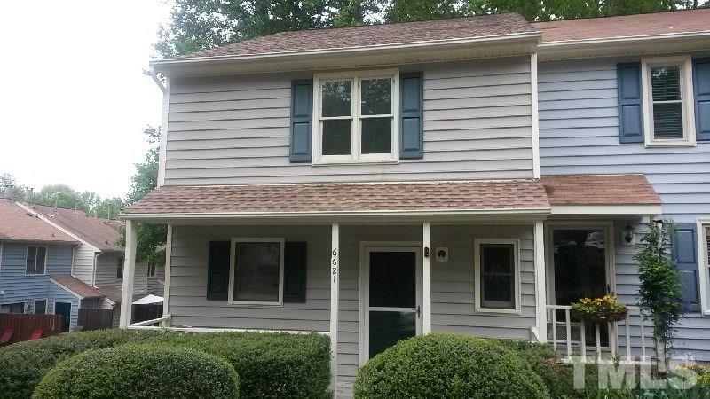6621 English Ivy Lane Raleigh, NC 27615 - Photo 1 of 17 a view of brick house with large windows
