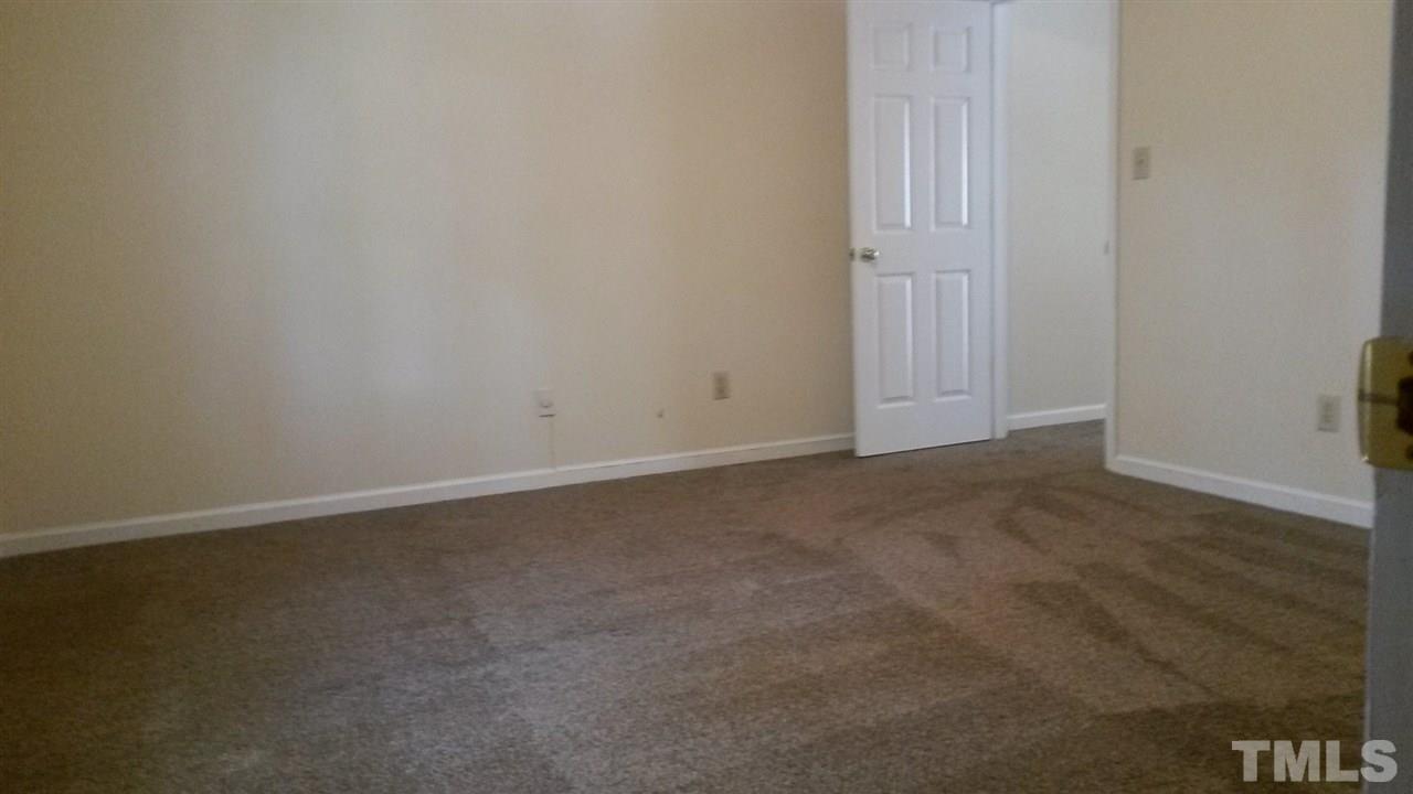 6621 English Ivy Lane Raleigh, NC 27615 - Photo 6 of 17 a view of an empty room