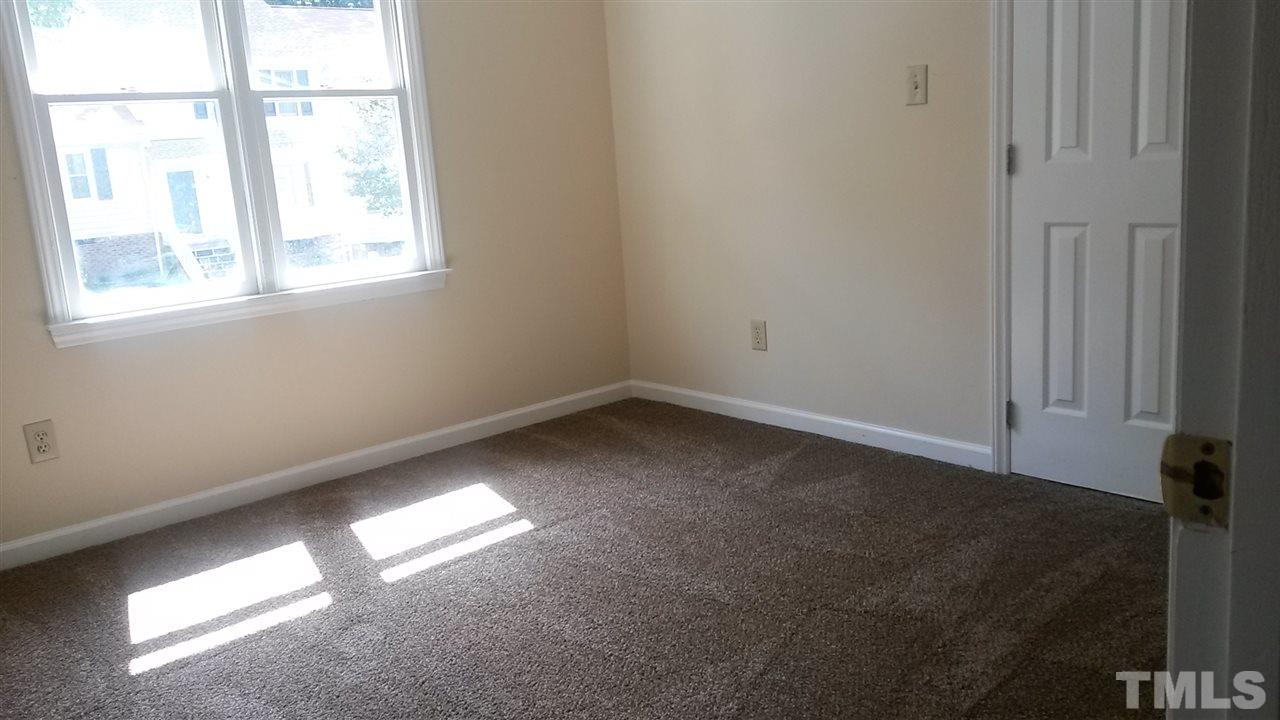 6621 English Ivy Lane Raleigh, NC 27615 - Photo 7 of 17 an empty room with a window