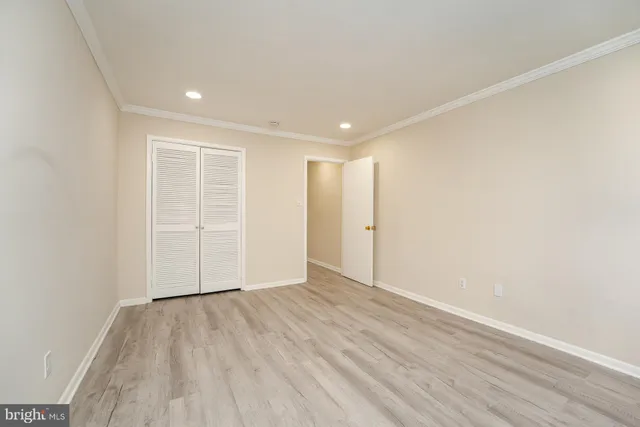 a view of wooden floor in an empty room