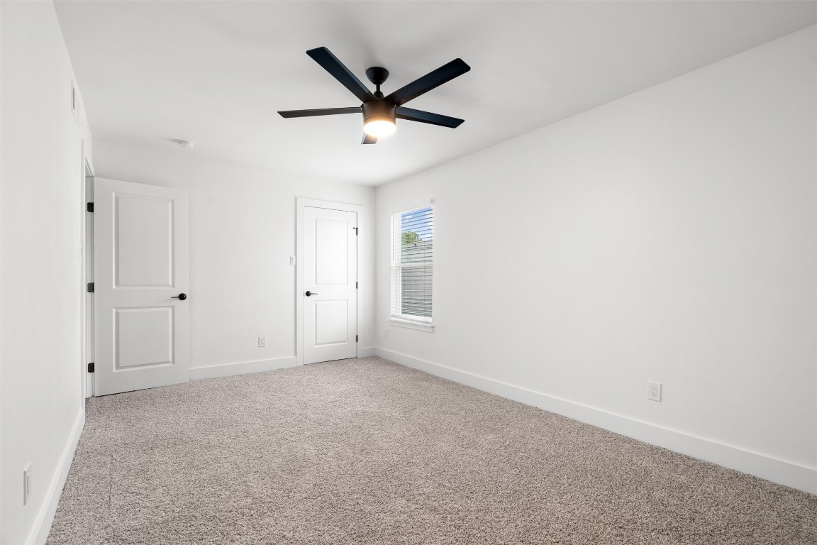 1901 Hearthstone Drive, Unit D Austin, TX 78757 - Photo 24 of 30 wooden floor in an empty room