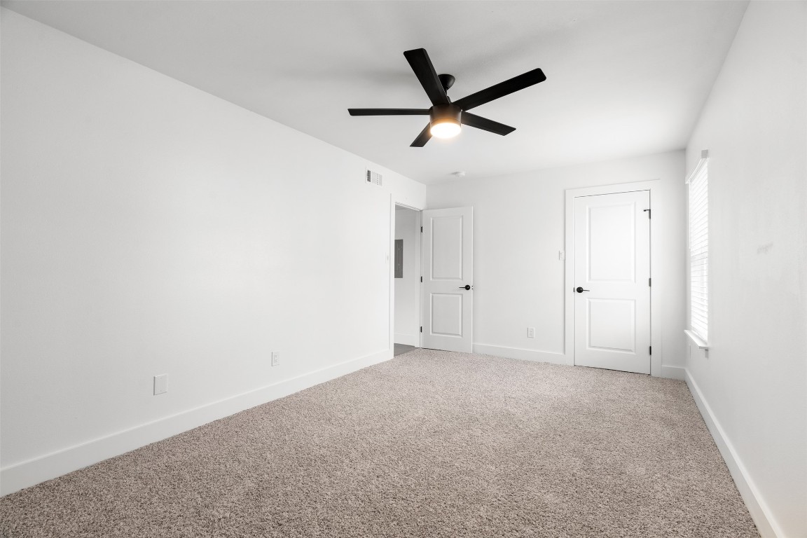 1901 Hearthstone Drive, Unit D Austin, TX 78757 - Photo 27 of 30 wooden floor in an empty room