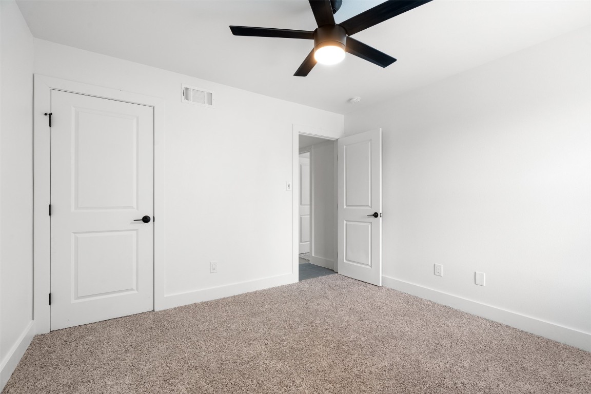 1901 Hearthstone Drive, Unit D Austin, TX 78757 - Photo 30 of 30 an empty room with closet area