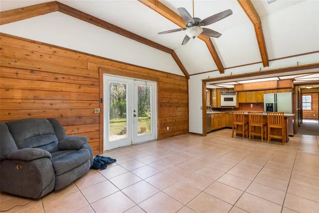 a living room with furniture and a window