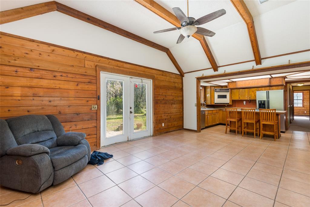 2641 McIntosh Road Dover, FL 33527 - Photo 13 of 58 a living room with furniture and a ceiling fan