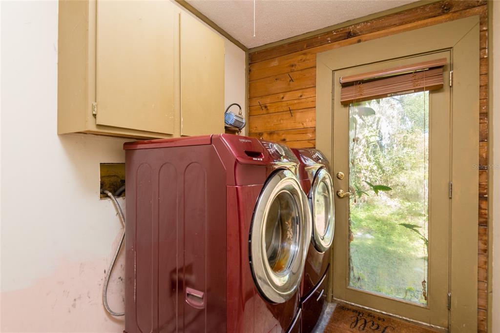 2641 McIntosh Road Dover, FL 33527 - Photo 17 of 58 a utility room with dryer and washer
