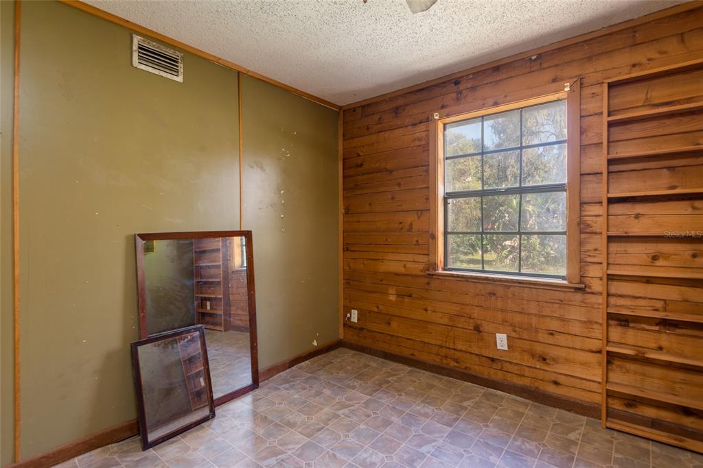 2641 McIntosh Road Dover, FL 33527 - Photo 20 of 58 a view of an empty room and window
