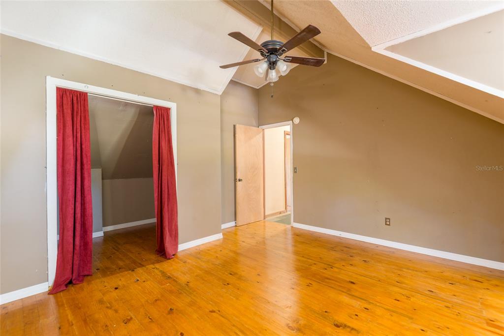 2641 McIntosh Road Dover, FL 33527 - Photo 25 of 58 a view of a room with a ceiling fan