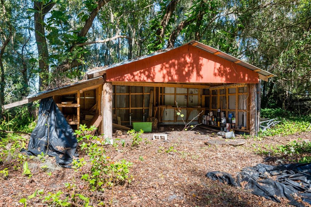 2641 McIntosh Road Dover, FL 33527 - Photo 41 of 58 a view of a house with yard and sitting area