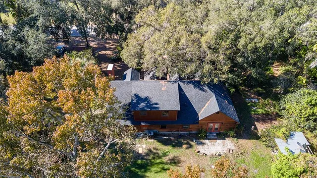 front view of a house with a trees