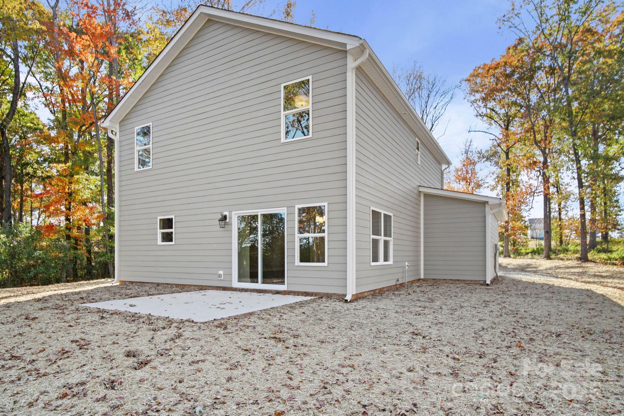2601 Plyler Mill Road Monroe, NC 28112 - Photo 12 of 23 a view of a house with a backyard