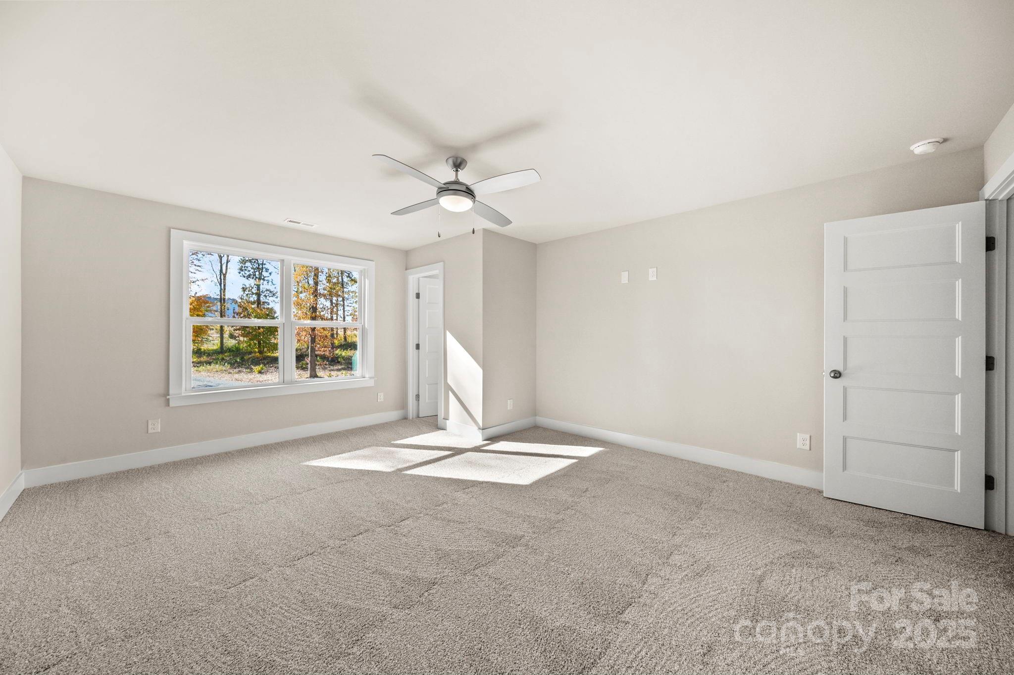 2601 Plyler Mill Road Monroe, NC 28112 - Photo 16 of 23 a view of an empty room with a window
