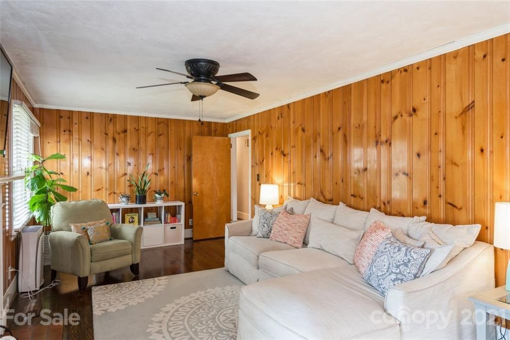 632 Scaleybark Road Charlotte, NC 28209 - Photo 15 of 36 a living room with furniture and a large window