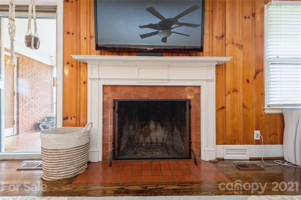 632 Scaleybark Road Charlotte, NC 28209 - Photo 17 of 36 a view of fireplace with a chair