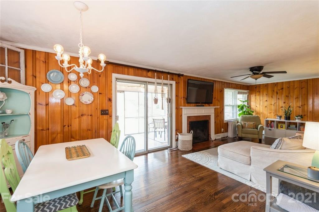 632 Scaleybark Road Charlotte, NC 28209 - Photo 19 of 36 a living room with furniture fireplace and flat screen tv