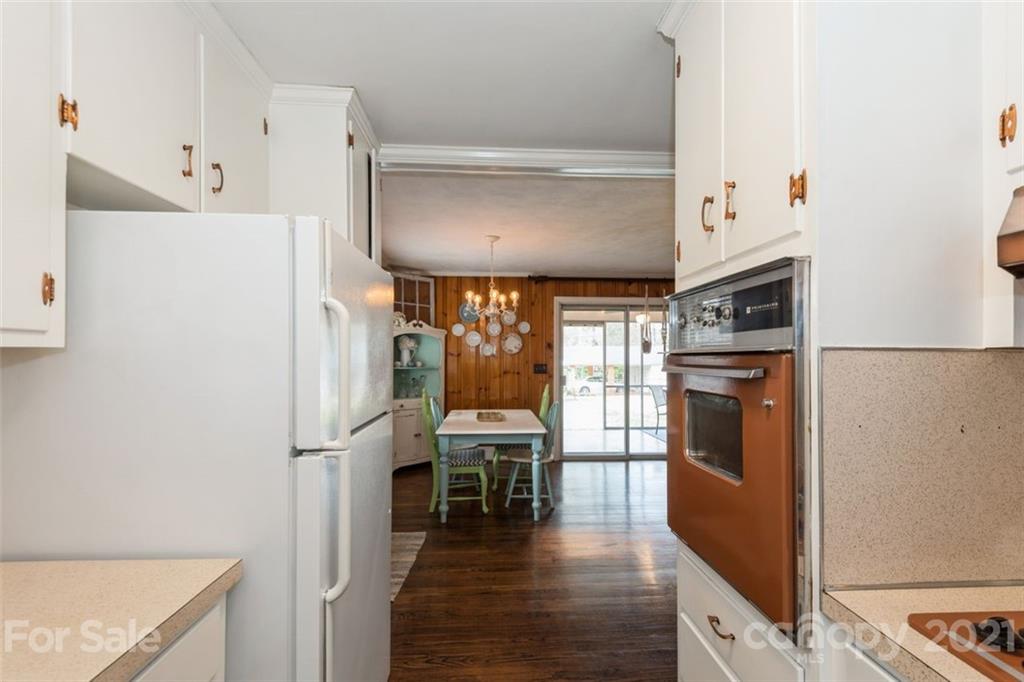 632 Scaleybark Road Charlotte, NC 28209 - Photo 24 of 36 a kitchen with stainless steel appliances granite countertop a refrigerator and a stove