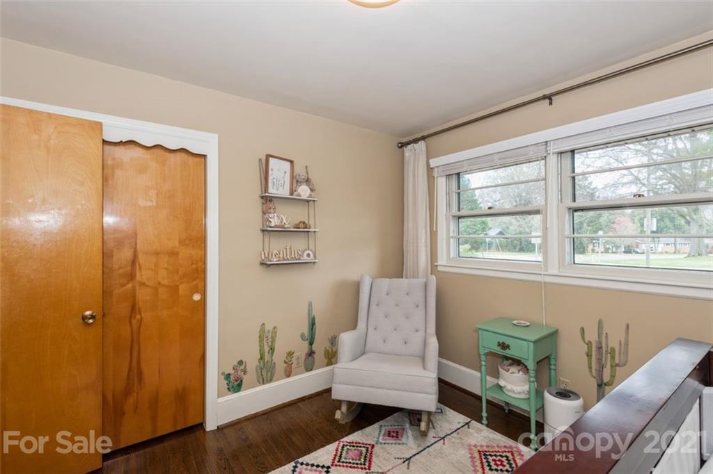 632 Scaleybark Road Charlotte, NC 28209 - Photo 28 of 36 a living room with furniture and a window