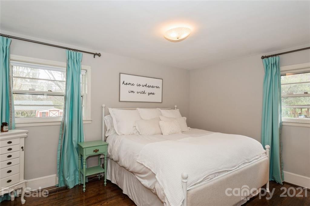 632 Scaleybark Road Charlotte, NC 28209 - Photo 32 of 36 a bedroom with a bed and a window
