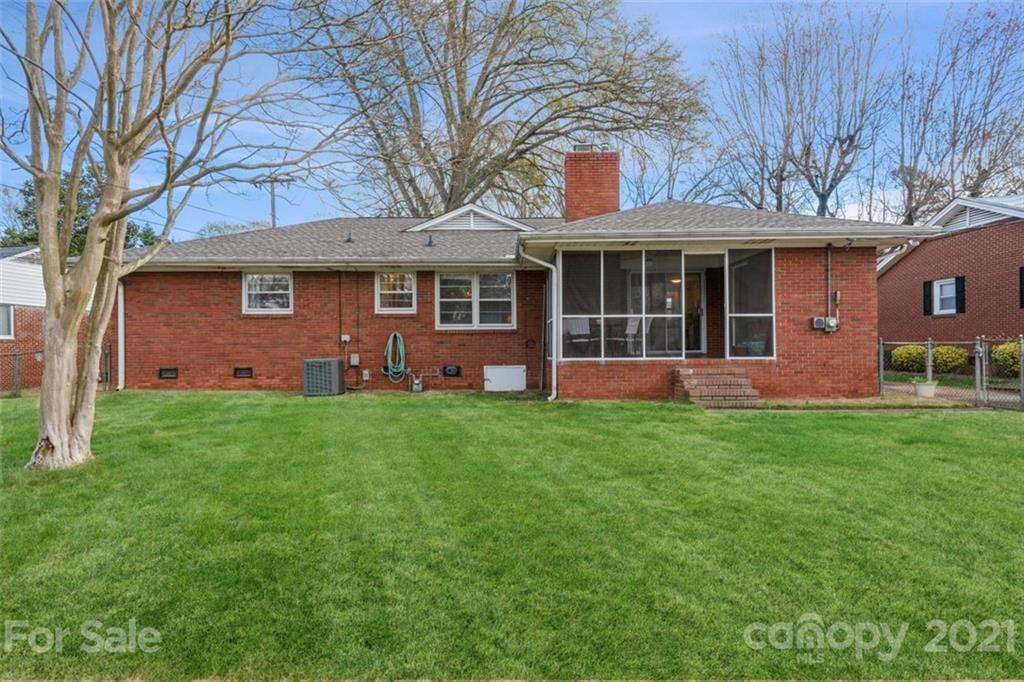 632 Scaleybark Road Charlotte, NC 28209 - Photo 5 of 36 a view of a house with a backyard