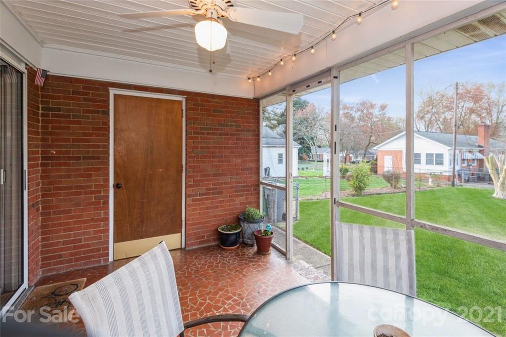 632 Scaleybark Road Charlotte, NC 28209 - Photo 9 of 36 a view of a porch with furniture and garden