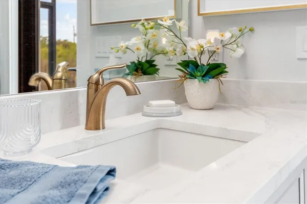 a view of a chairs and table in patio