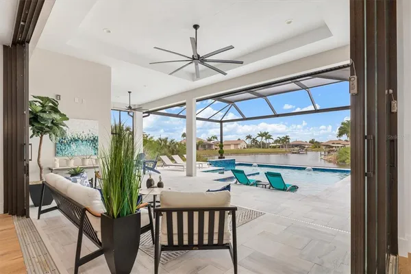 a view of a patio with swimming pool