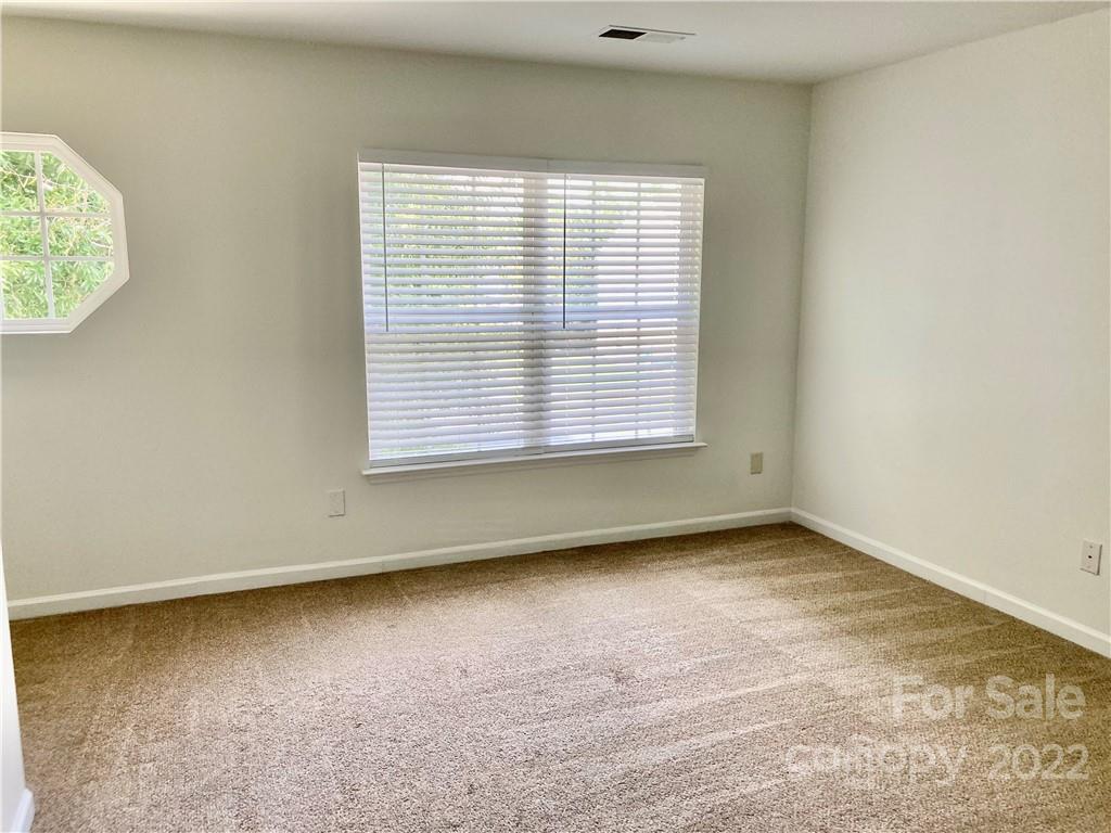 6432 Hermsley Road Charlotte, NC 28278 - Photo 19 of 32 an empty room with a window