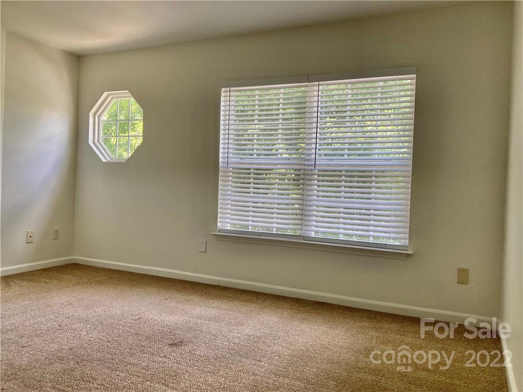 6432 Hermsley Road Charlotte, NC 28278 - Photo 21 of 32 an empty room with a window