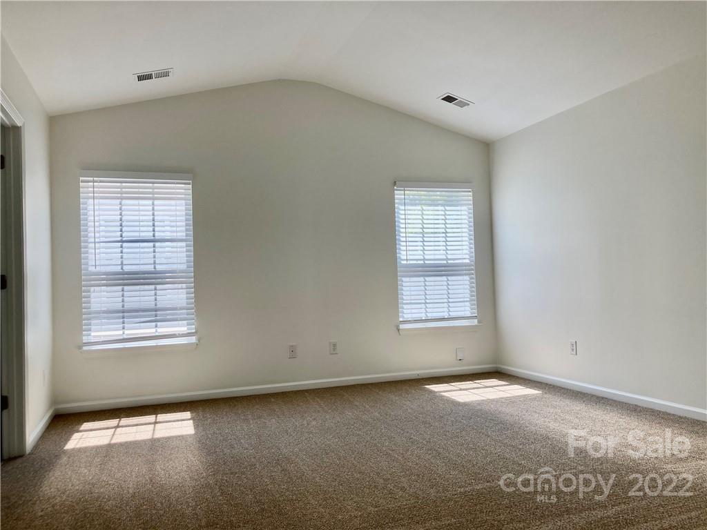 6432 Hermsley Road Charlotte, NC 28278 - Photo 25 of 32 an empty room with windows
